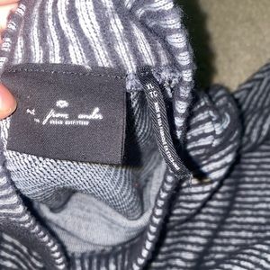 Rubber sweater mock top